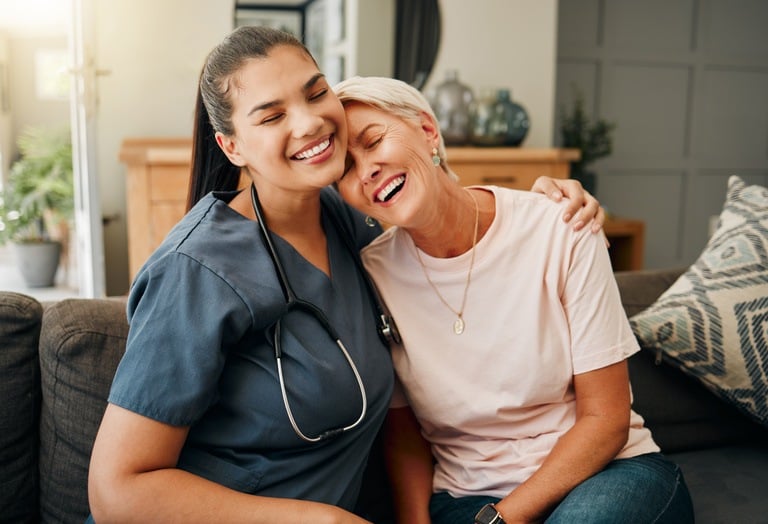 nurse and woman hugging