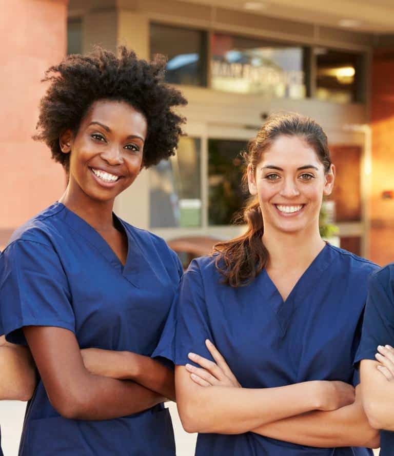 two female license practical nurses standing. About Us